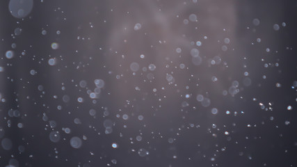 Bokeh blur light glitter black background