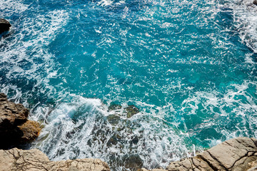 dark blue sea and rocks