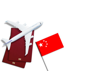 Visa to China concept. Chinese flag near passport on white background top-down copy space