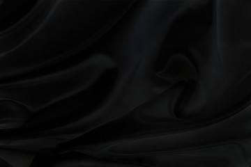 Black gray satin dark fabric texture luxurious shiny that is abstract silk cloth background with patterns soft waves blur beautiful.