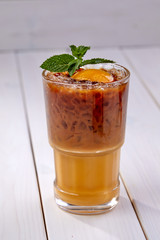 summer cocktail with fruits and mint