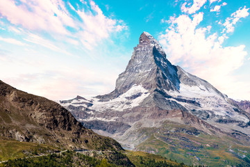 Fascinating landscape with  with the top of the mountain Matterhorn in the clouds in the Swiss Alps, near Zermatt, Switzerland