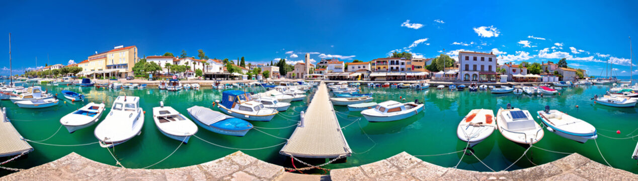 Krk. Town of Malinska harbor and turquoise waterfront panoramic view