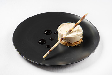 Christmas cheesecake on the black plate