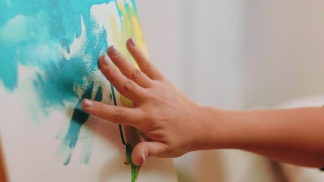 Fine art hobby. Inspiration entertainment. Female hand painting on canvas.