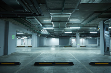 Horizontal image of empty underground parking lot