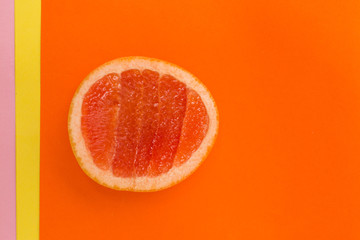 Art Nouveau style concept image, Blood Orange on orange color / multi colored geometric trendy background, food and healthy concept 