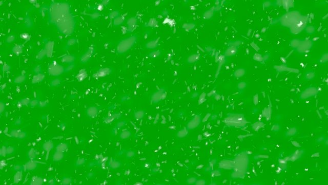 High quality motion animation snow falling on green screen background. Heavy  flying snowflakes overlays background
