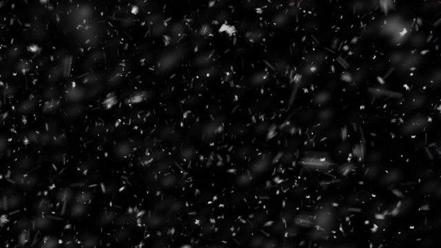 High quality motion animation snow falling on black background. Heavy  flying snowflakes overlays background
