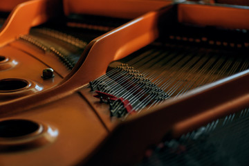 The inside of the piano