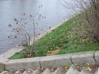 Stone stairs to the river in autumn Saint-Petersburg