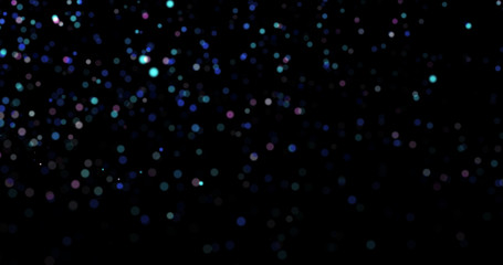 Flying dust particles on a black background