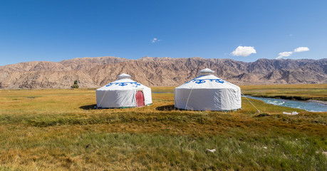 Fototapeta na wymiar Tashkurgan, China - located 3.500m above the sea level, and last city before the border with Pakistan, Tashkurgan is a modern town which still presents a nomad soul. Here in the picture a yurta