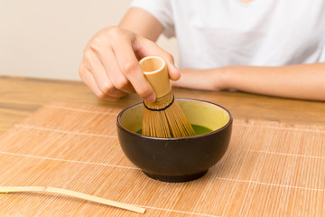 Young asian girl with tea matcha
