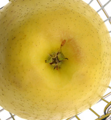yellow apple in shopping cart