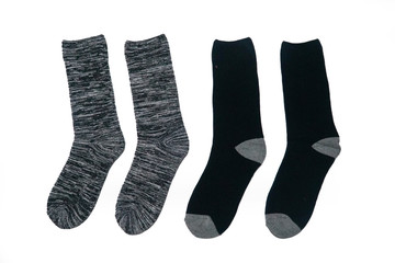 Pair of gray and black socks isolated white background