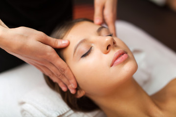Fototapeta na wymiar Beautiful woman having an head massage