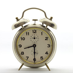 Old-style alarm clock, metal, it's half past eight.