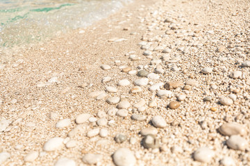 Beach rocks on sand