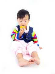 Asian little boy wearing a Korean Traditional Hanbok dress in white background