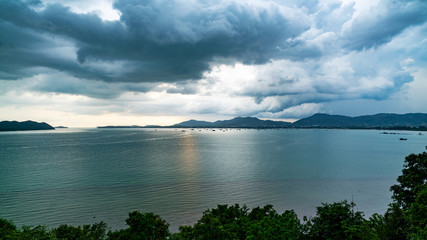 Dark Rain cloud over the sea before heavy rain storm in the island.
