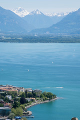 Alps Mountains and Vevey town near Geneva Lake