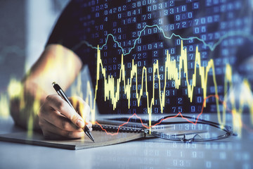 Multi exposure of woman's hands making notes with forex graph hologram. Concept of technical...