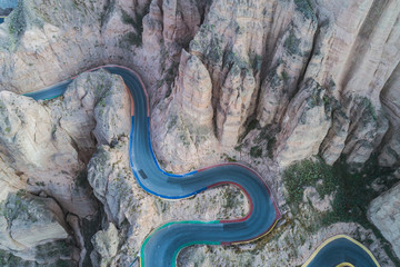 aerial view of a steep mountain road