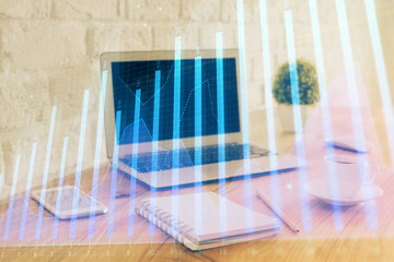 Obraz na płótnie Canvas Forex Chart hologram on table with computer background. Double exposure. Concept of financial markets.