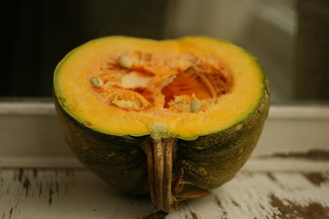 pumpkin in the countryside. yellow autumn pumpkin on an old wooden window