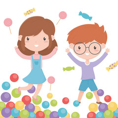 happy childrens day, smiling little boy and girl candies and colorful balls