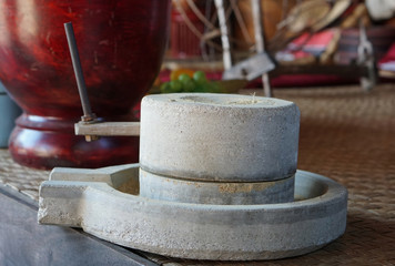 Antique flour milling machine By grinding mortar made from cement or stone.The ancient stone mill in Thailand is a type of stone grinding machine used for grinding Thai desserts.