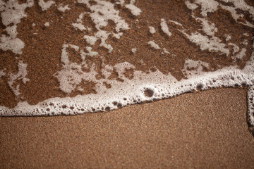 Sea waves hit the shore