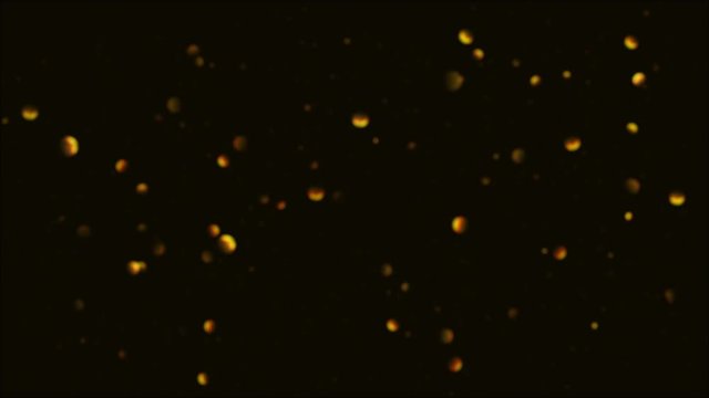 Abstract background with slow flying and flickering gold yellow small particles as bokeh of light.