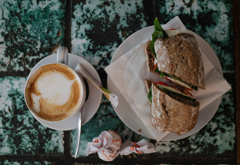 Italian breakfast, sandwich capresse and capuchino 