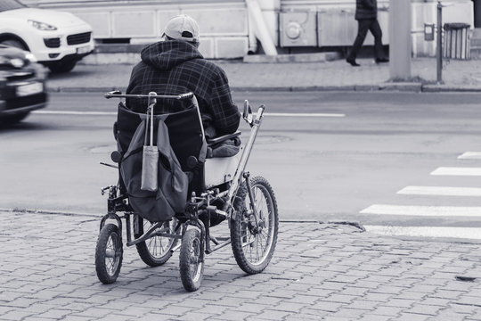 a homeless man in a wheelchair