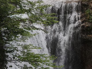 The waterfall Cave of the Arazas river in the Ordesa valley. National Park of Ordesa and Monte Perdido in the Pyrenees of the province of Huesca. Aragon. Spain