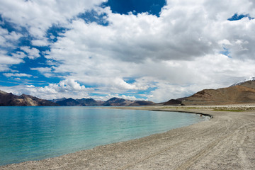 Fototapeta premium Ladakh, India - Aug 05 2019 - Pangong Lake view from Between Maan and Merak in Ladakh, Jammu and Kashmir, India. The Lake is an endorheic lake in the Himalayas situated at a height of about 4350m.