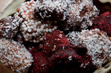 cook at home. chocolate workshop. homemade chocolate. Homemade candy in chocolate basket. chocolate art background. sweet life. holiday celebration. candy shop. sprinkles and topping