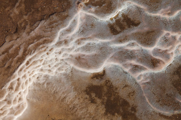  Water coming from Strokkur forming abstract patterns. Geysir sometimes known as The Great Geysir,...
