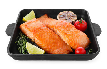 Delicious roasted fish in pan isolated on white