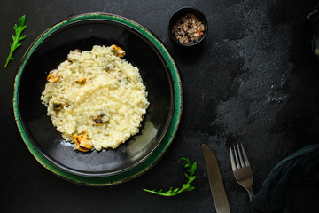 risotto mussels main course (delicious rice with seafood) menu concept. food background. top view. copy space