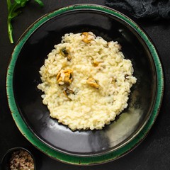 risotto mussels main course (delicious rice with seafood) menu concept. food background. top view. copy space