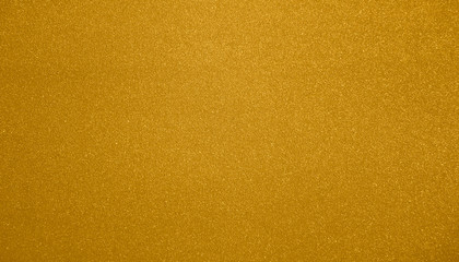 Gold color concrete wall background for texture