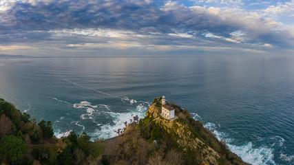 Getaria lighthouse at dusk, Basque country - drone aerial view
