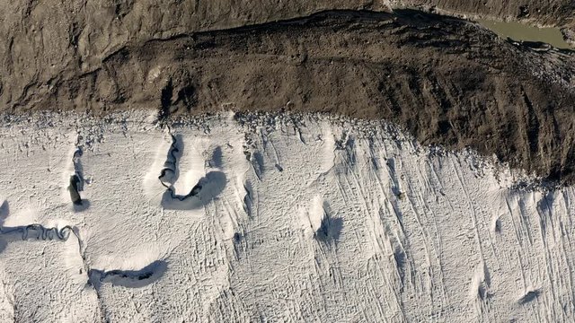 Top down aerial view of the Gornergletscher glacier, moving backward slowly