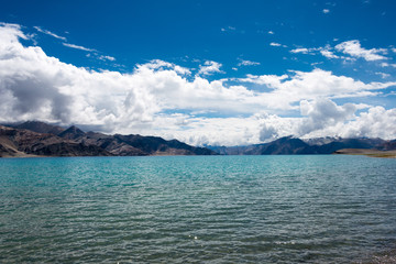 Fototapeta na wymiar Ladakh, India -Aug 06 2019 - Pangong Lake view from Between Kakstet and Chushul in Ladakh, Jammu and Kashmir, India. The Lake is an endorheic lake in the Himalayas situated at a height of about 4350m.