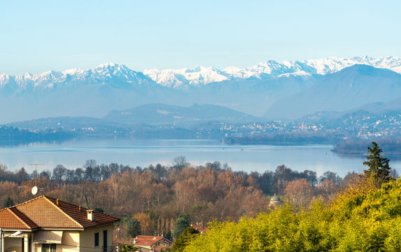 Landscape with view of Lake Varese and snow capped mountains from Azzate Belvedere, province of Varese, Italy