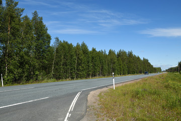 Northern highway in Finnish Lapland in summer day