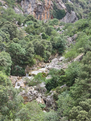 Cascades of the Guadalquivir River as it passes through Cerrada de Utrero in the Natural Park of the Sierra de Cazorla, Segura and Las Villas. In Jaén, Andalusia. Spain